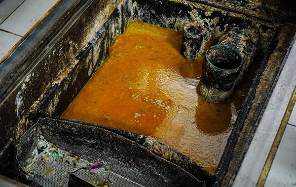 regular grease trap cleaning can prevent costly plumbing issues and reduce the risk of fines, conserving you money in the long run